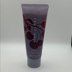 Fenty Beauty Purple Tube with Red Cherry Graphics